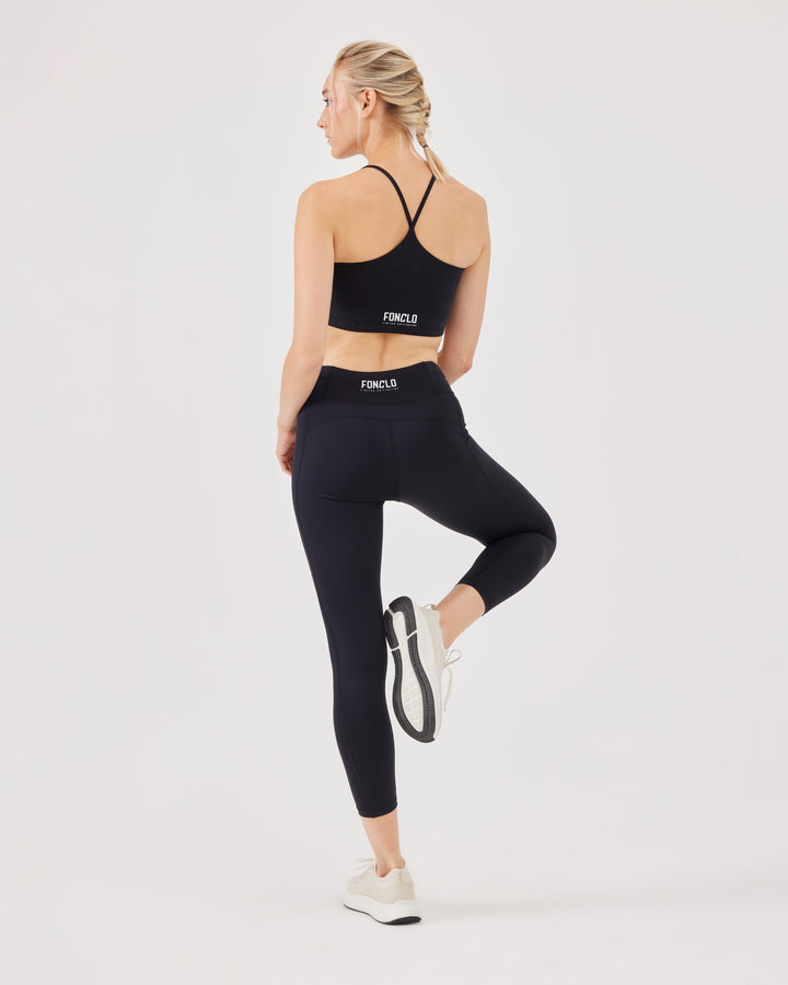 Black, halterneck top, crossed straps, sports bra, elastic band, racerback, crop, slim fit, fonclo logo.