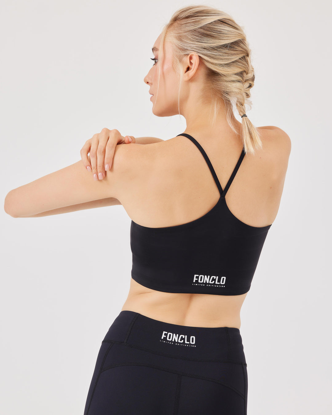 Black, halterneck top, crossed straps, sports bra, elastic band, racerback, crop, slim fit, fonclo logo.