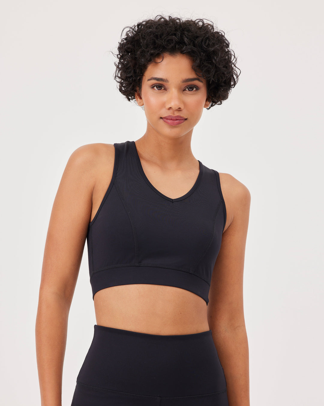 Black, sports bra, crossed straps, wide straps, elastic band, fonclo logo, top, crop, sleeveless, v-neck, slim fit, cut-out. 