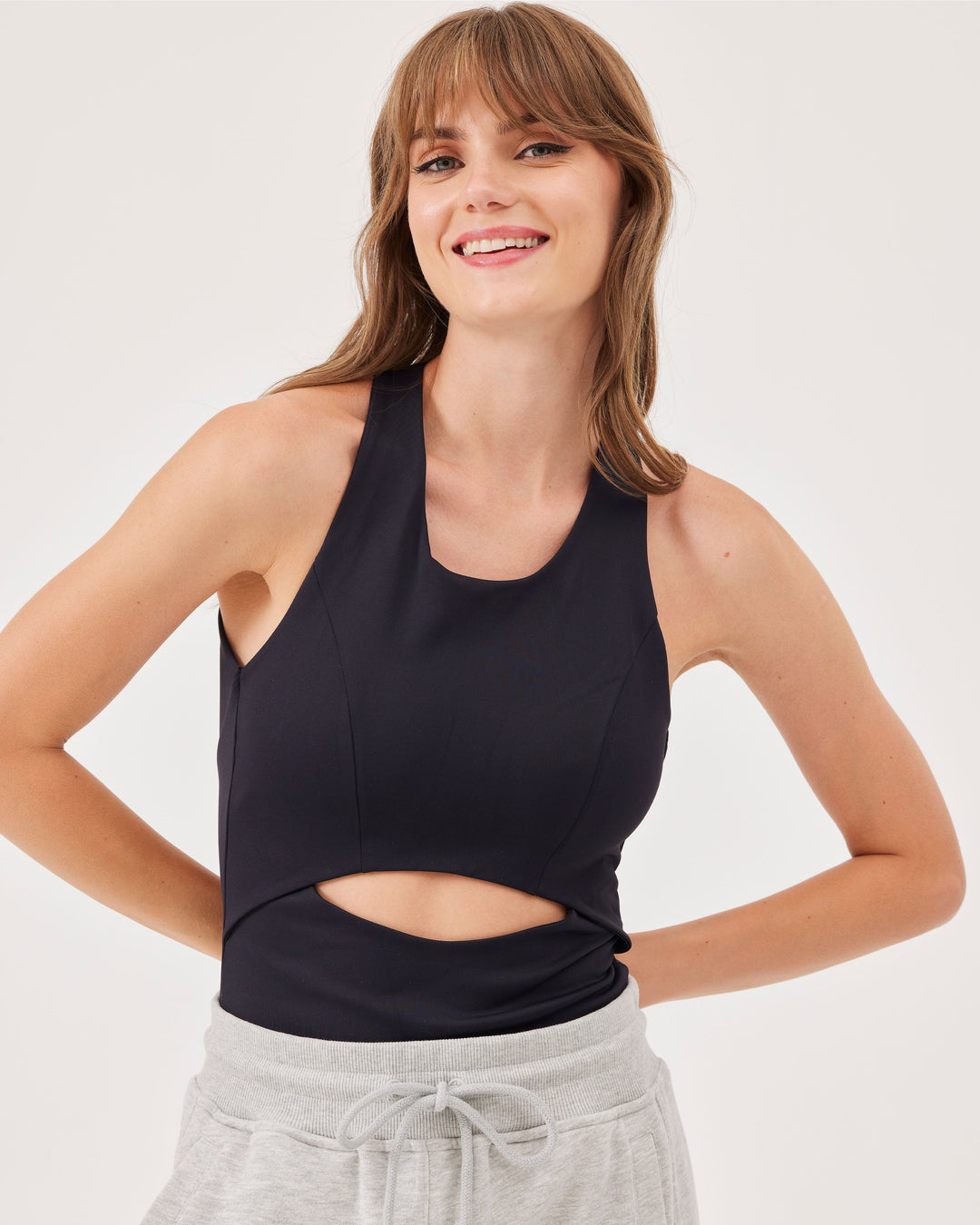 Black, tanktop, fonclo logo on the back, sleeveless, wide straps, cut-out details on the front and back, regular length, slim fit, u-neck, crossed straps, open back. 