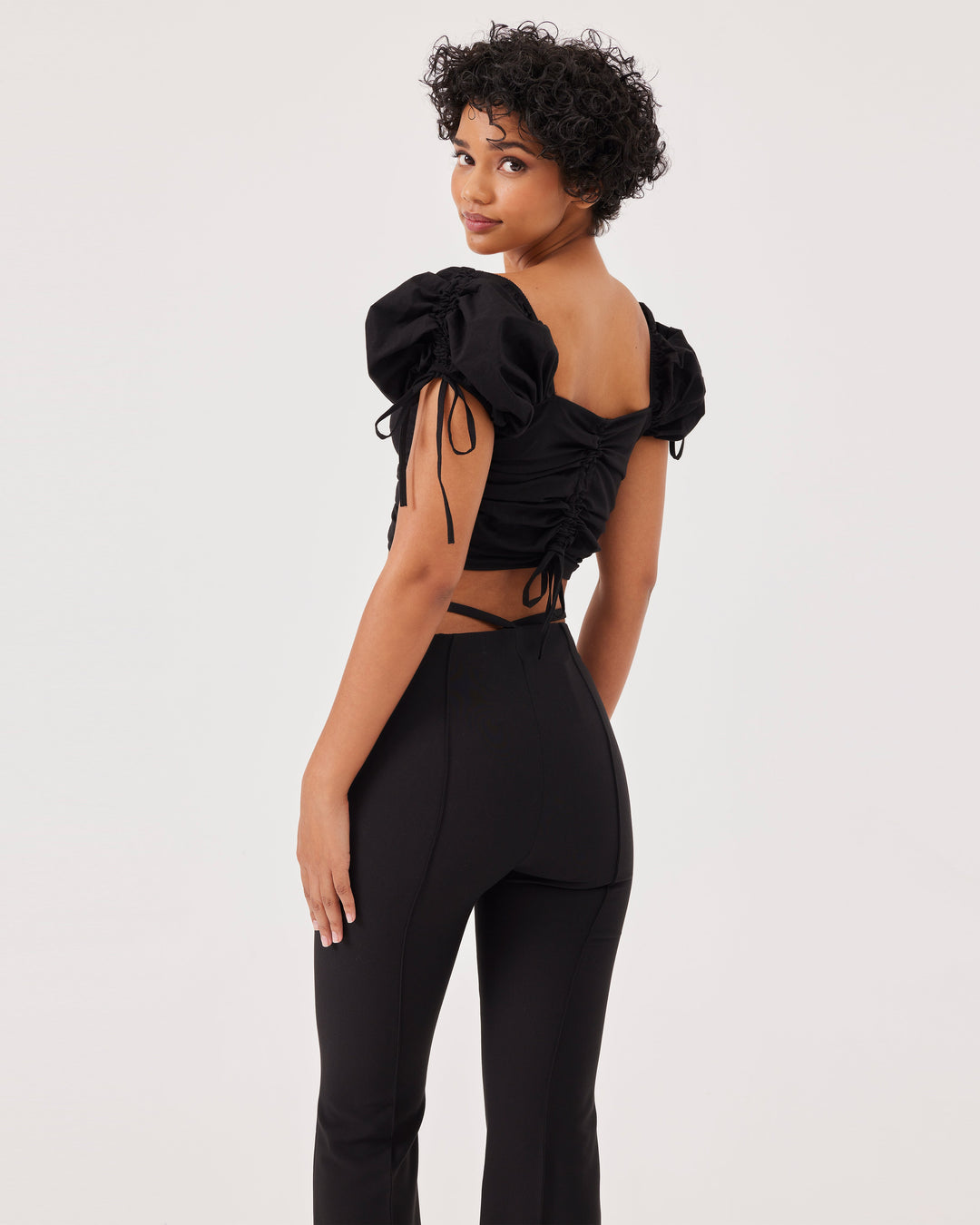 Black, puff sleeves, crop, blouse, with lacing, front, back, and sleeve lacing. top, side zipper,  short sleeves, slim fit, poplin. 