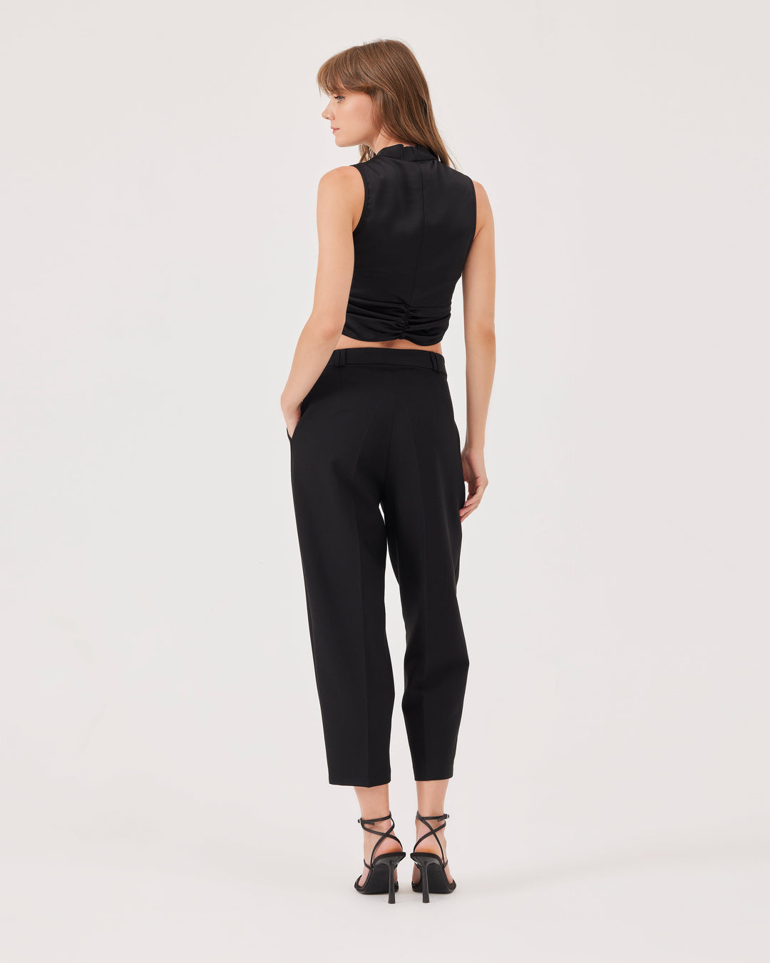 Black, draped crop blouse, v-neck, sleeveless, elegant, front knot detail, regular fit, draped waist, top. 