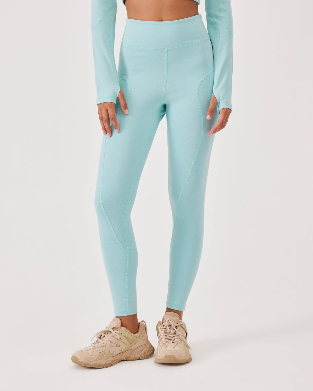 Blue, high-waisted ankle-length leggings with Fonclo logo on the back. Made from high-quality stretch fabric. Suitable for gym and daily wear.