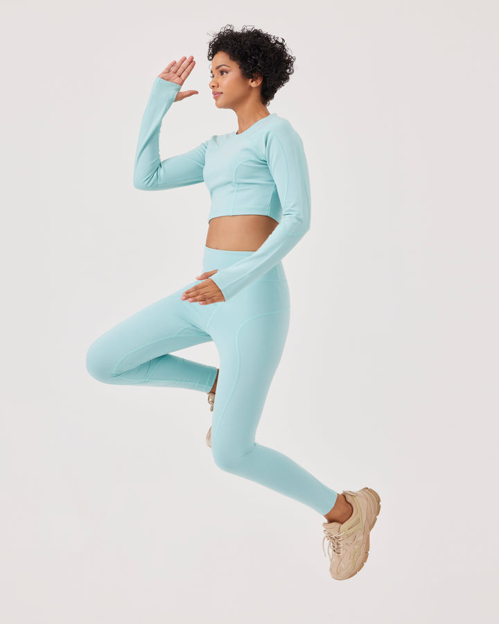 Blue, high-waisted ankle-length leggings with Fonclo logo on the back. Made from high-quality stretch fabric. Suitable for gym and daily wear.