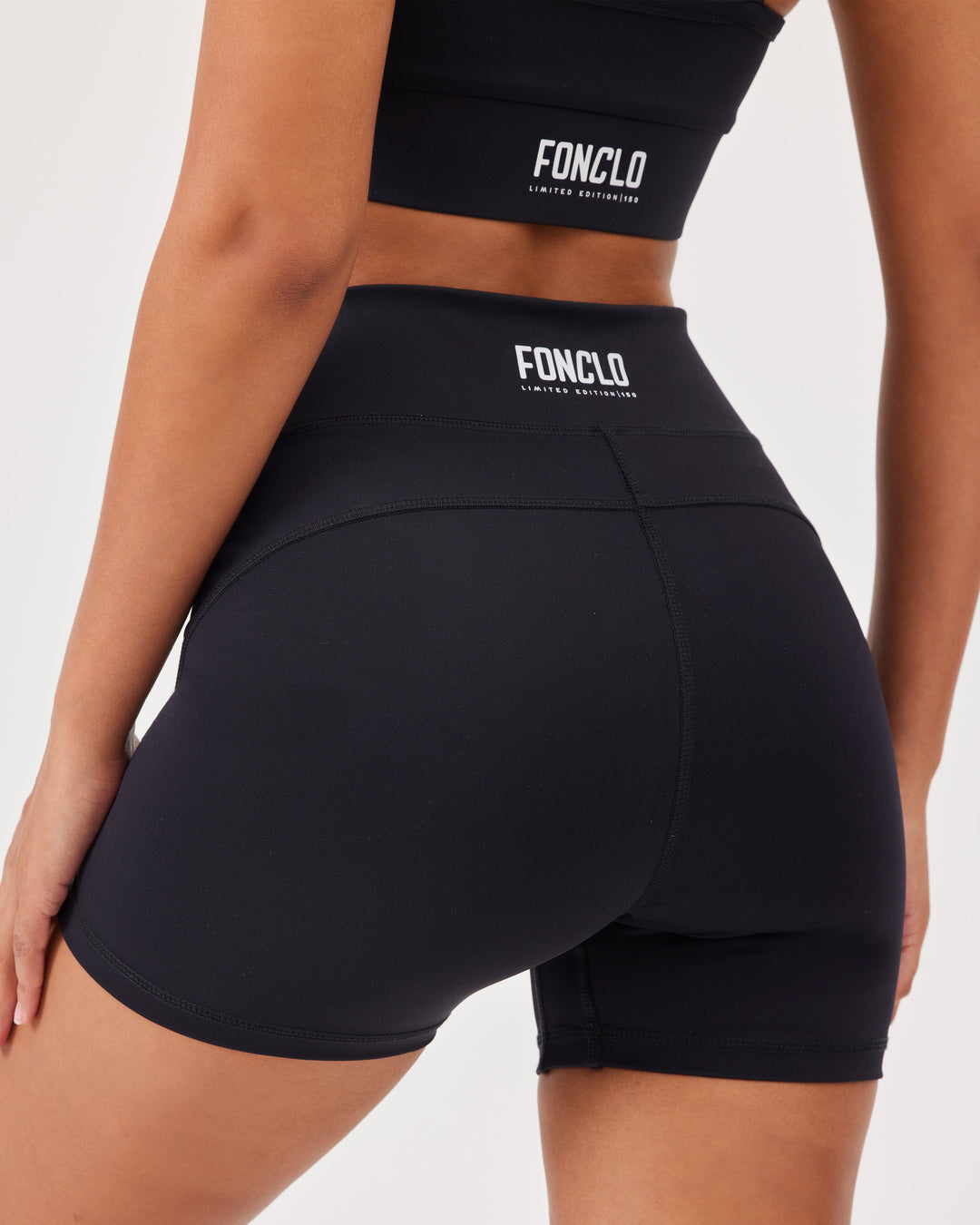 Black, sports cycling shorts, fonclo logo on the back, bikershorts, slim fit, high-waist, stretchy. 