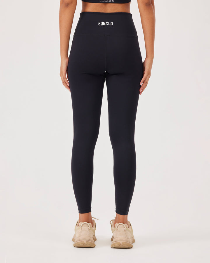 Black ankle-length high-waist leggins, fonclo logo on the back, slim fit, high-quality stretch fabric.