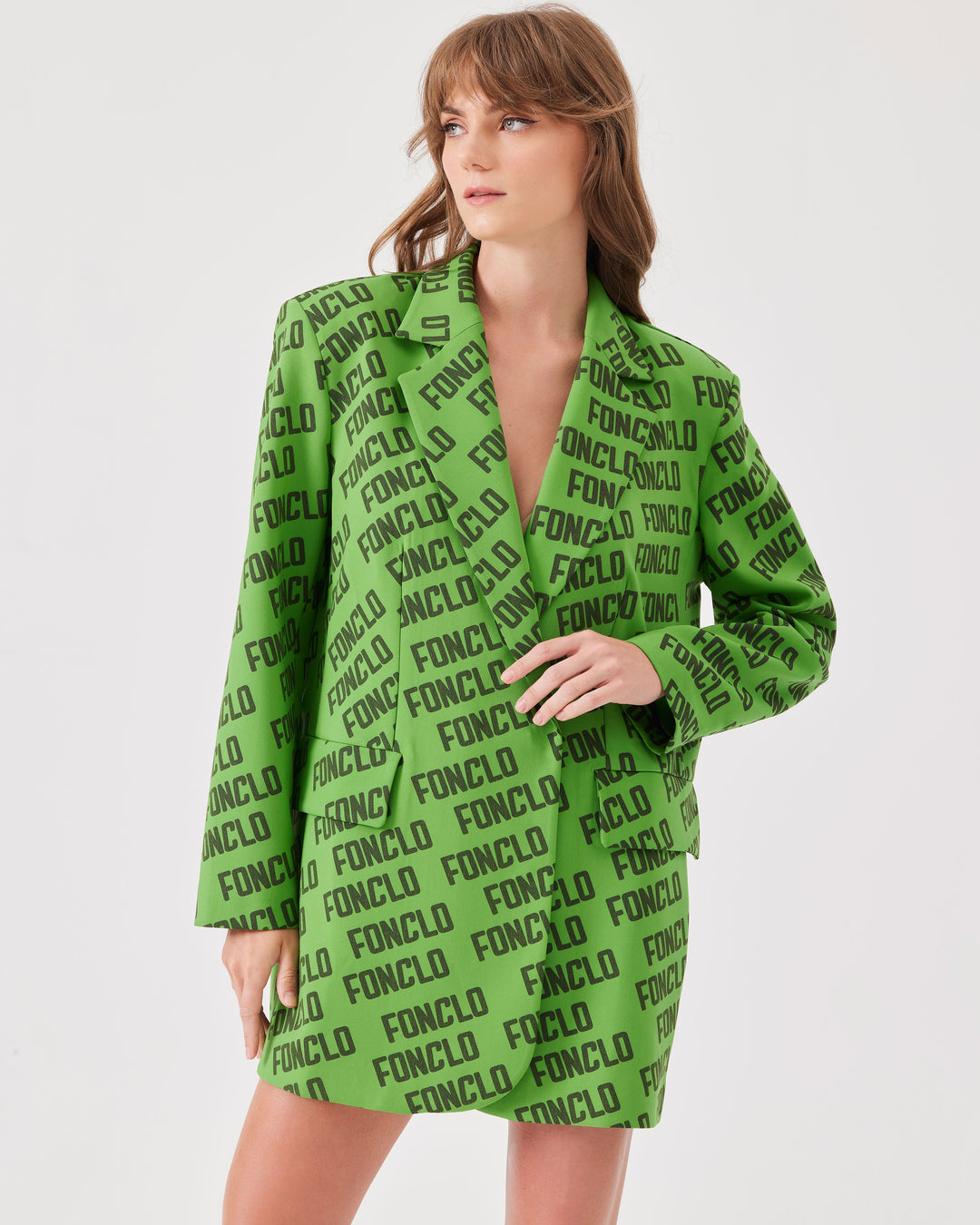 Green, monogram, overBeden, blazer, shoulder pads, allover monogram pattern, concealed buttons,  front pockets, long sleeve, lapel collar. 