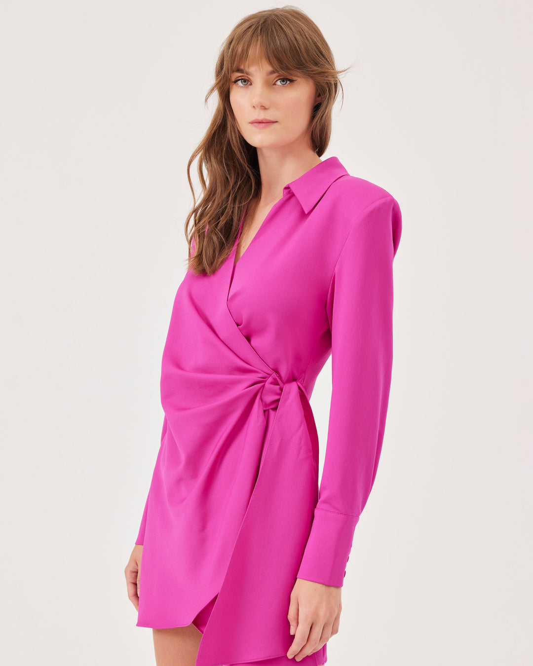 Pink, wrap dress, tie bands, mini, long sleeves, buttons on the cuffs, collared, v-neck, concealed button, shoulder pads, short, regular fit.