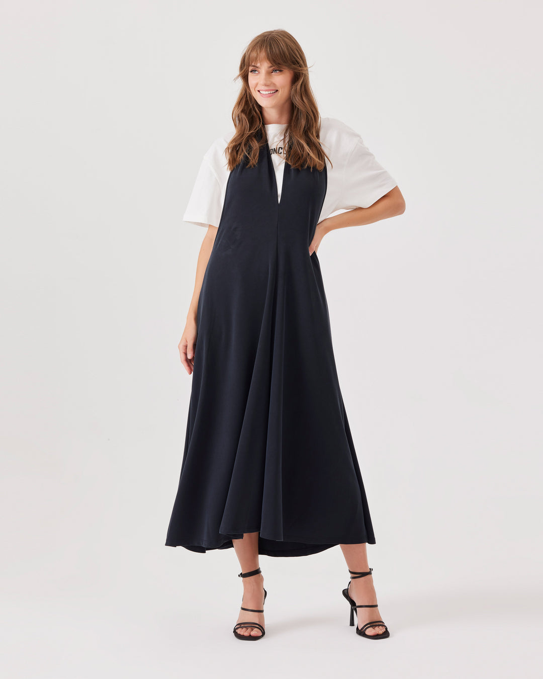 Black, midi,  lyocell-blend, halterneck dress, ankle-length, tencel blend fabric, wide straps tied at the neck, deep back cutout,  deep v-neckline.