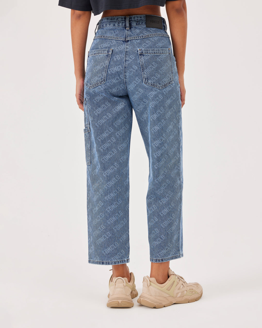 Blue, monogrammed, high-waist, ankle-length, mom jeans, allover fonclo monogram pattern, pockets on the front and back, two patch pockets on one leg, wide cut, mom fit, denim. 